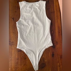 Balance Athleetica Vitality The Allora Bodysuit in Silver size Medium with tags!